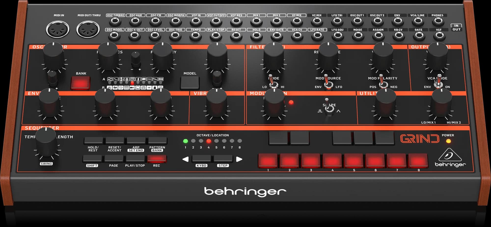 Close-up of a Behringer synthesizer control panel featuring various knobs, switches, and buttons with red and black colors, labeled with terms like OSC, FILTER, MODULATION, and SEQUENCER, indicating different functions for sound control and manipulation.