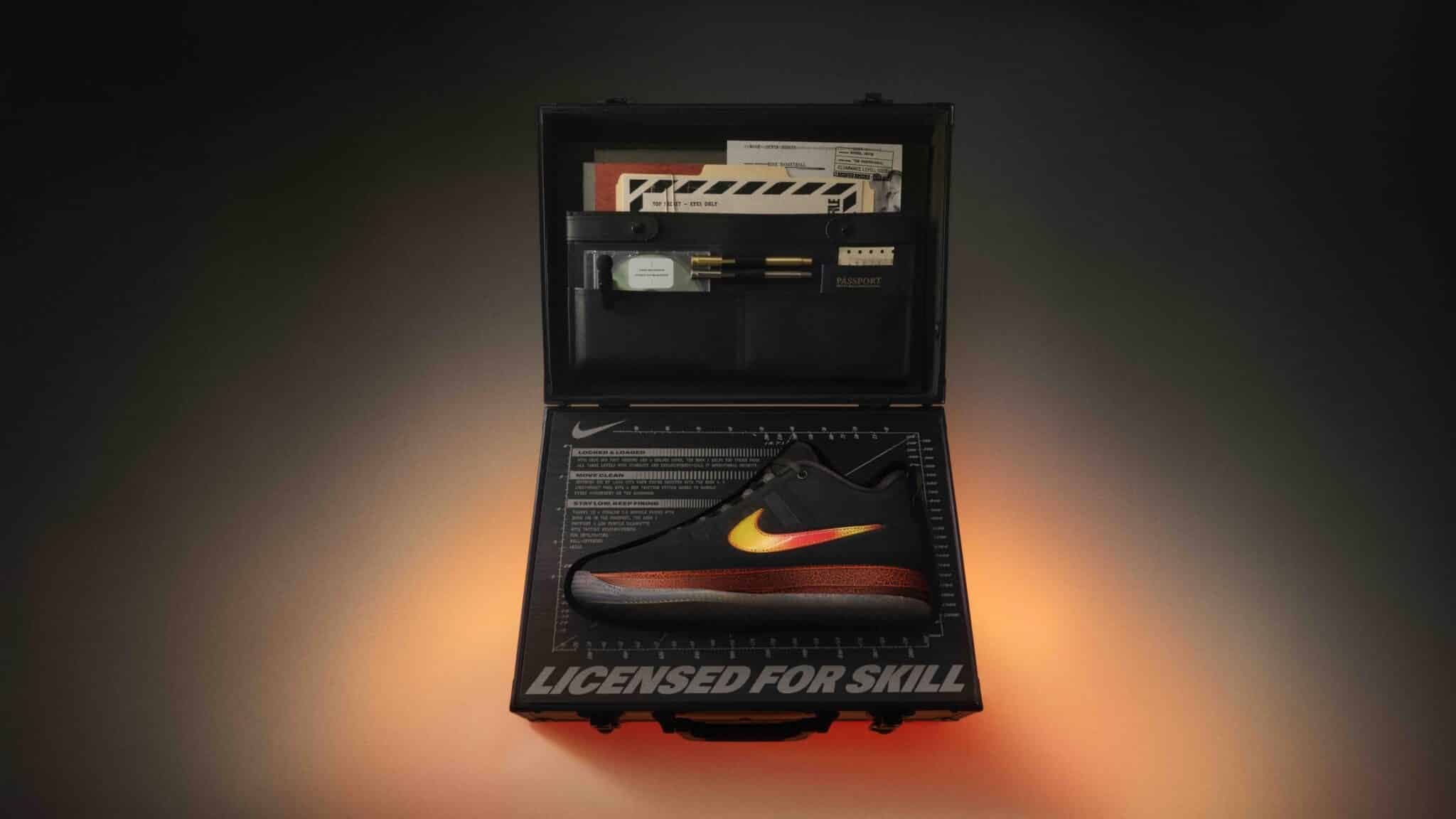 A black shoe with a gradient yellow to red swoosh design is presented inside an open briefcase, surrounded by documents and pens. The base of the briefcase displays the words "LICENSED FOR SKILL" in bold letters, with a glowing orange light illuminating the contents.