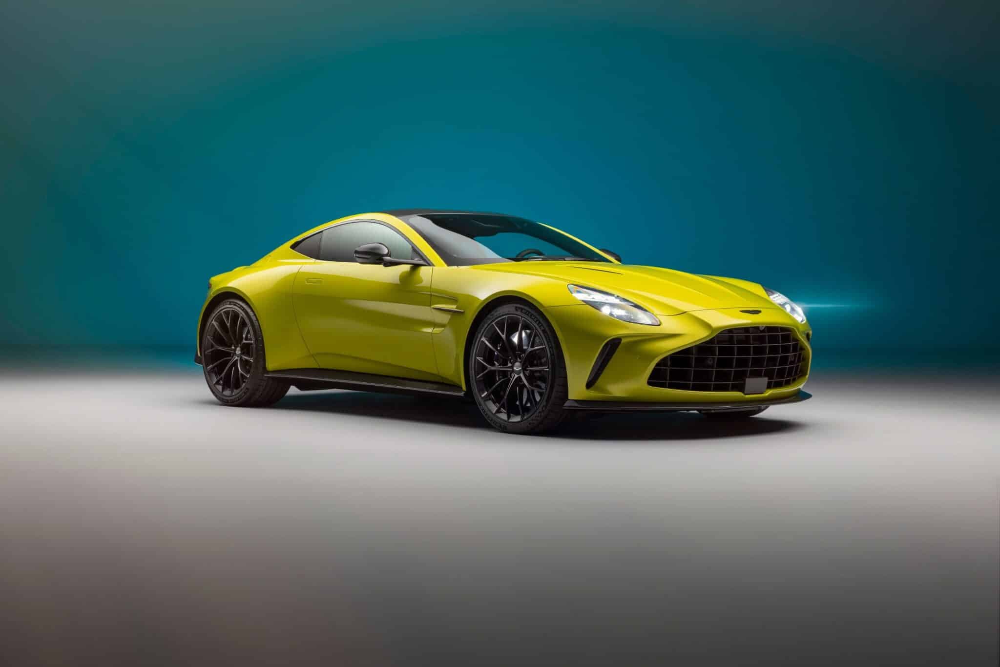 Lime-green sports coupe with black wheels, shown in a studio against a teal background