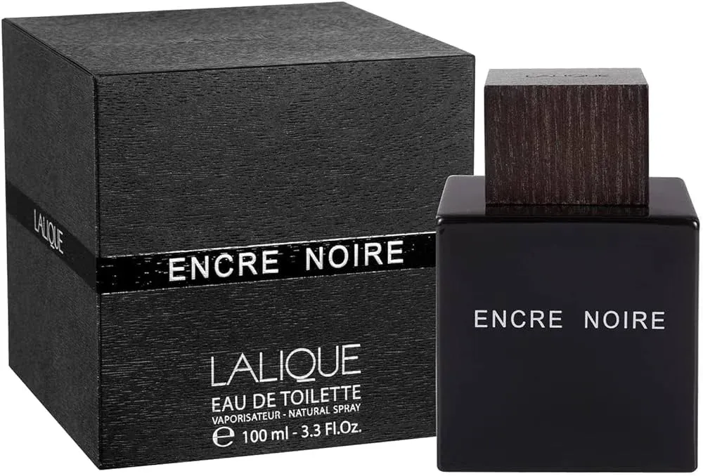 A bottle of Lalique Encre Noire Eau de Toilette next to its black textured packaging box.