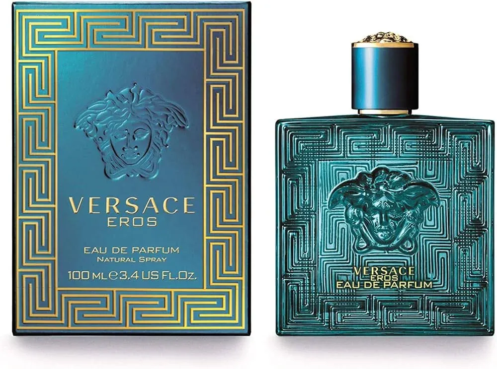 Versace Eros Eau de Parfum bottle and box; the box is turquoise with gold Greek key patterns and a Medusa head logo, while the matching bottle is adorned with similar designs and a gold-accented cap.
