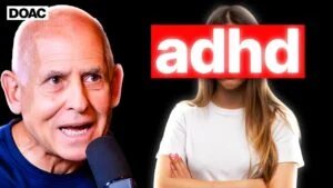An older man speaking into a microphone on the left, and a woman on the right with her face obscured by a red bar labeled 'adhd', both against a black background.