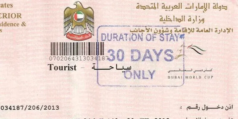 Dubai Visit Visa 2026 document for the United Arab Emirates with a 30-day duration of stay, featuring the UAE emblem and markings related to the Dubai World Cup.