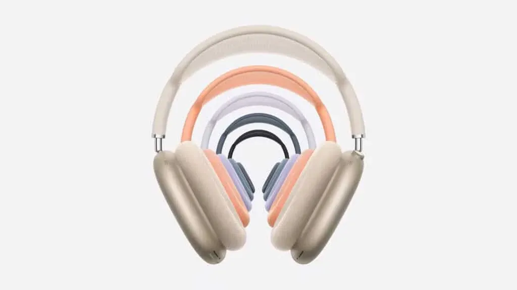 A series of over-ear headphones in various colors, arranged in a fan-like pattern, with each overlapping the next in a gradient of hues.