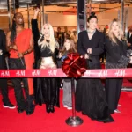 Singer Christina Aguilera and Daughter at H&M reopening