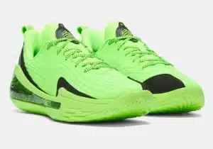 Bright neon green athletic shoes with black accents and patterned soles, featuring laces and a low-cut design.