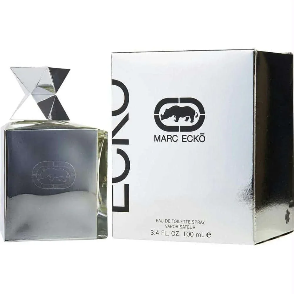 A Marc Ecko Eau de Toilette bottle and its matching box, both metallic silver in color. The bottle features a geometric, angled cap and an embossed logo of a rhinoceros. The box displays the same logo and text detailing the product as