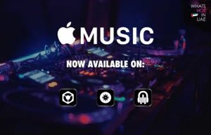 A promotional image announcing Apple Music is now available on DJ software platforms, with a blurred background of DJ equipment and neon lights, accompanied by logos of Rekordbox, Serato, and another platform, alongside text reading "What's Hot in UAE."