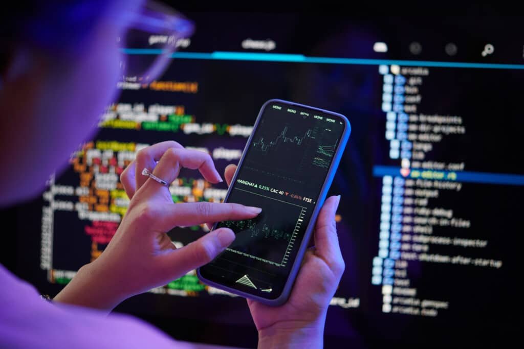 Crypto’s Next Big Surge: Examining Code on Smartphone While Sitting at Desk