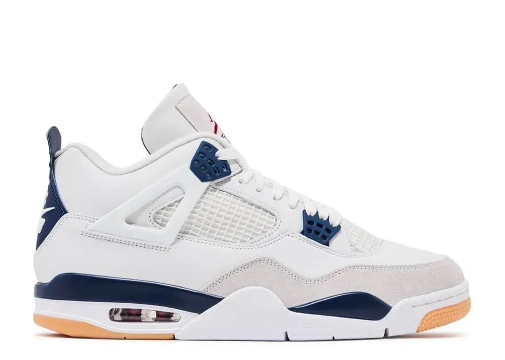 A white sneaker with blue and orange accents, featuring mesh side panels and a visible air cushion in the heel.
