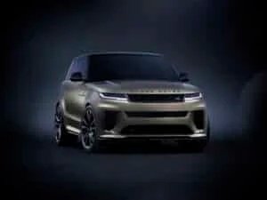 A sleek, modern SUV with a metallic finish, featuring sharp headlights and a distinctive grille, shown against a dark gradient background.