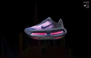 A stylish Nike sneaker displayed against a dark background, featuring a gradient color scheme of purple and black with illuminated pink accents in the sole.