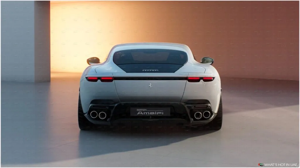 Rear view of a white luxury sports car with a sleek design, four exhaust pipes, and distinctive taillights, parked in a minimalistic indoor setting with soft lighting.