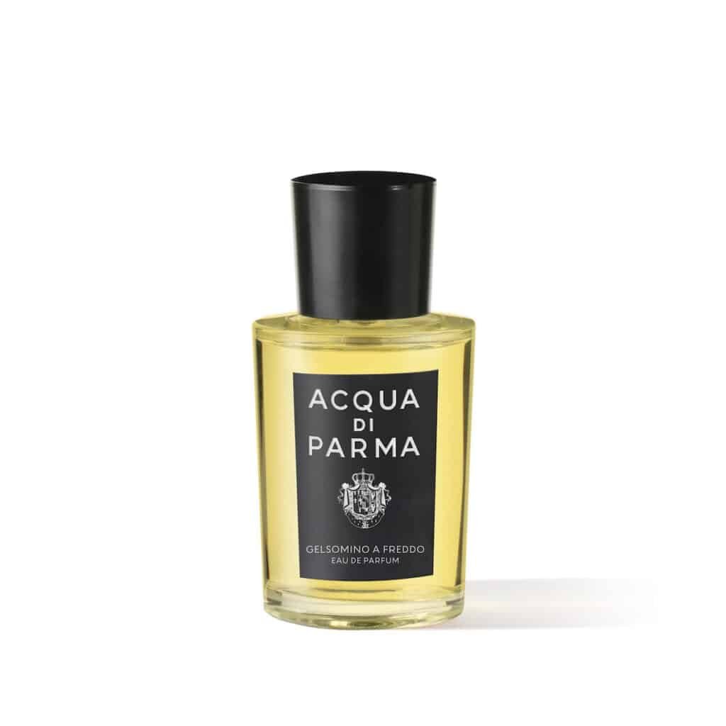 A bottle of Acqua di Parma Gelsomino a Freddo Eau de Parfum with yellow liquid and a black label and cap, displayed against a white background.