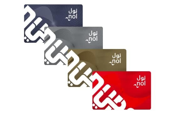 Four Nol cards in different colors: blue, silver, gold, and red, used for public transport in Dubai.