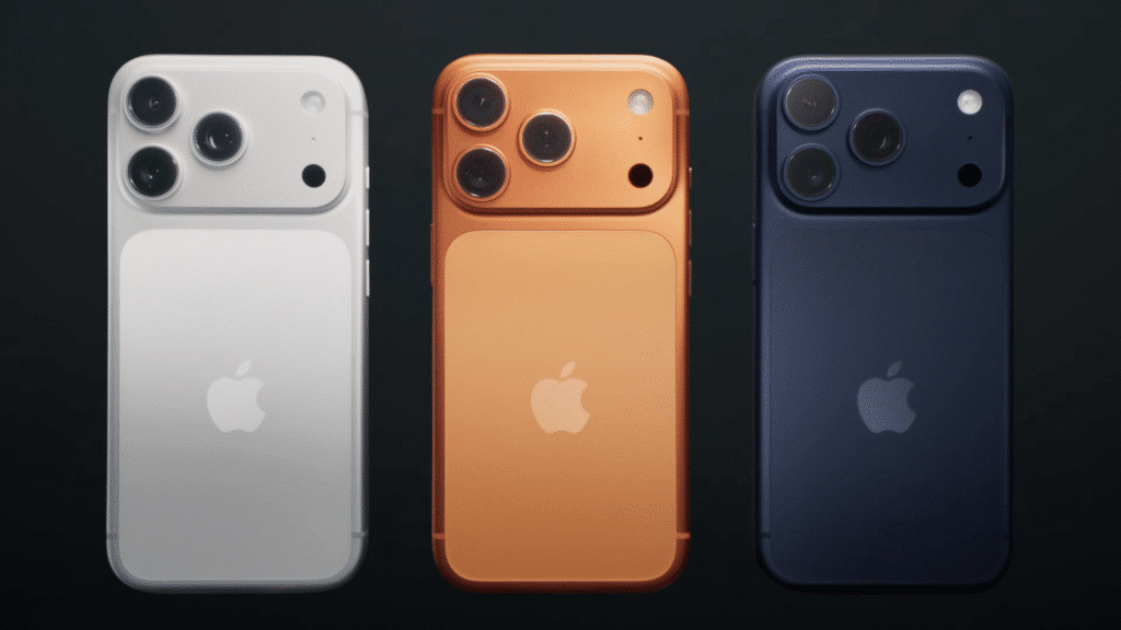 Three smartphones displayed vertically, each showing the back side with the Apple logo. They are in different colors: white, orange, and dark blue, featuring a distinctive, rectangular camera module with three lenses on the upper left corner.