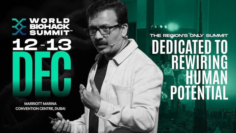 A promotional image for the World Biohack Summit taking place on December 12-13 at the Marriott Marina Convention Centre in Dubai, featuring a speaker with a microphone headset and text emphasizing the event's focus on "Rewiring Human Potential."