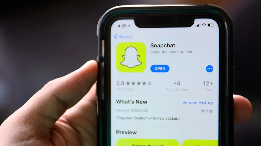 huge internet outage: A smartphone screen displaying the Snapchat app page on the App Store, showing the app icon, rating, and an "Open" button.