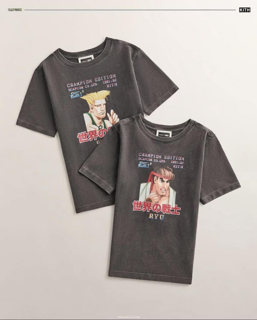 Two black t-shirts featuring characters Guile and Ryu from the Street Fighter game series, each with the text 'CHAMPION EDITION' and Japanese kanji.