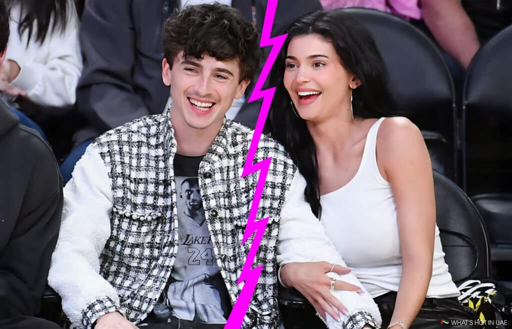 Two people sitting next to each other, separated by a pink zigzag line.