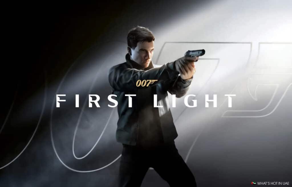 Illustration of a man holding a gun, positioned in a dramatic pose against a dark background with beams of light, with the text '007 First Light' in the foreground.