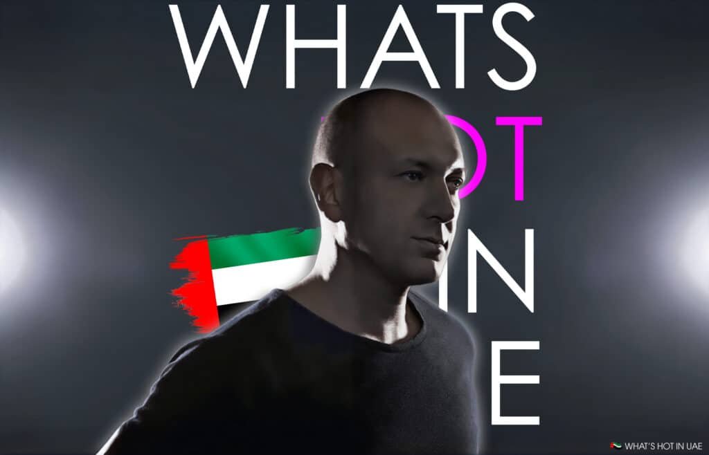Marco Carola in a dimly lit setting with the text "WHAT'S HOT IN UAE" and the UAE flag on a dark background.