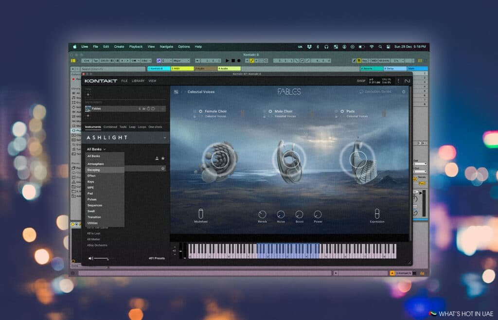 A computer screen displaying a Native Instruments Kontakt 8 digital audio workstation with a music production interface, showing various instruments and settings like 'Celestial Voices' and options for Female Choir, Male Choir, and Pads, along with a virtual keyboard at the bottom. Blurred colorful lights are in the background.