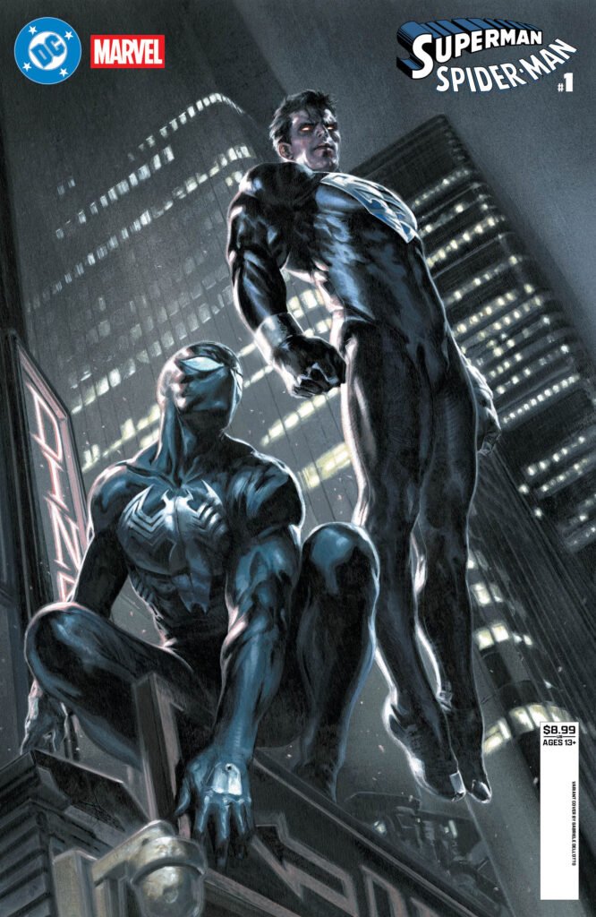 Two superheroes in black suits stand on a ledge in a cityscape at night, with tall buildings in the background.