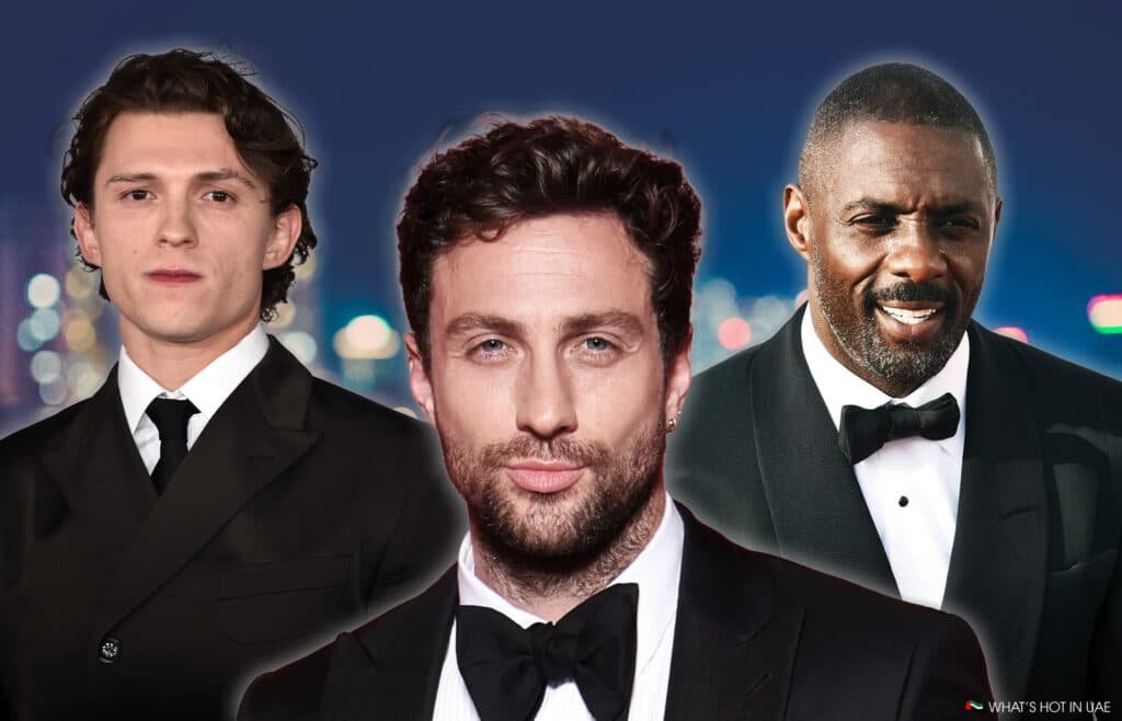Idris Elba, Aaron Taylor-Johnson and Tom Holland in formal suits pose against a blurred, colorful cityscape backdrop could be the next James bond.