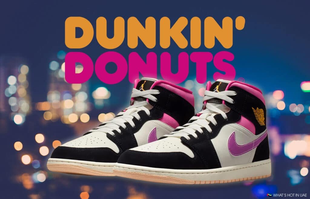 A pair of high-top sneakers with pink and black accents against a blurred city lights background, with "Dunkin' Donuts" text above.