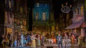 A vibrant opera performance set in a lively street scene with singers dressed in period costumes and a backdrop of vintage buildings.
