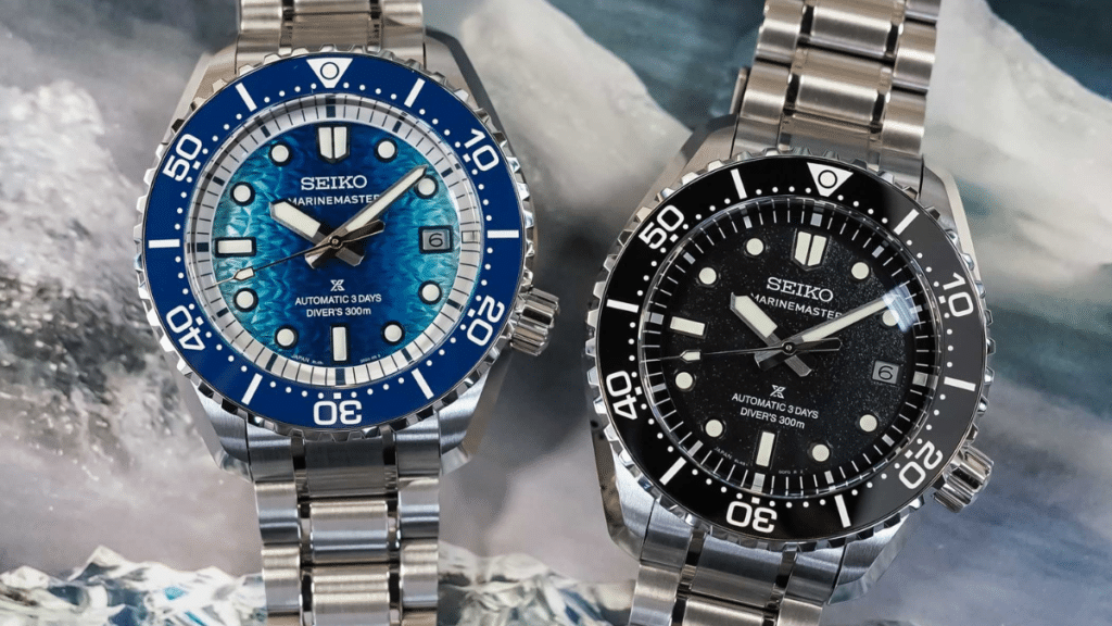 Two Seiko sports watches on metal bracelets; one with a blue dial and bezel, the other with a black dial and bezel.