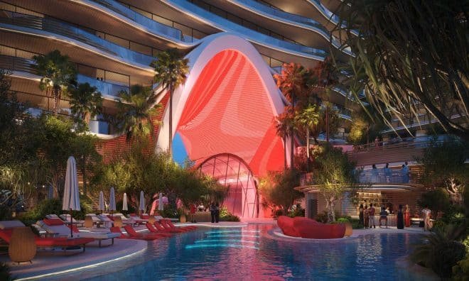 A luxurious resort pool area with vibrant pink and red lighting, surrounded by palm trees and modern architecture.