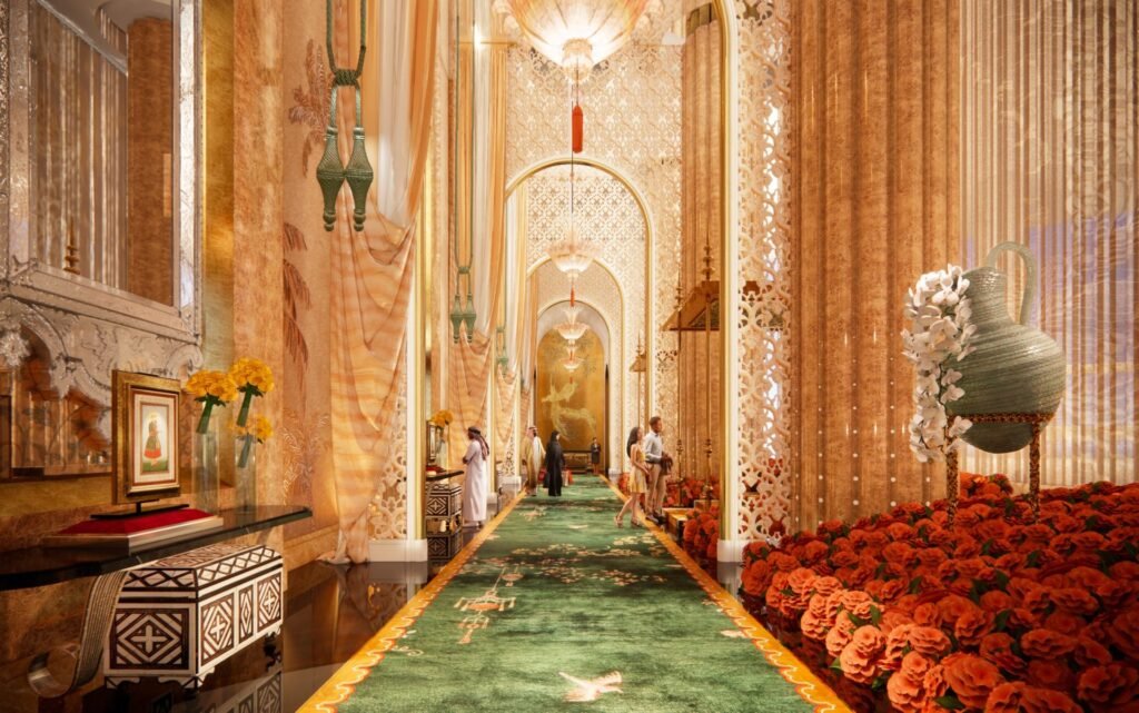 Ornate hallway with arched doorways, intricate patterns, a green carpet, and decorative vases, lined with orange roses.
