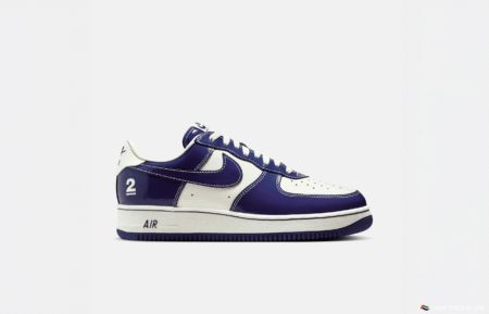 A white and purple sneaker with the number 2 on the heel and "AIR" on the midsole.