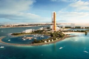 Aerial rendering of a luxury island resort with a tall tower, marina, beaches, and yachts under a blue sky