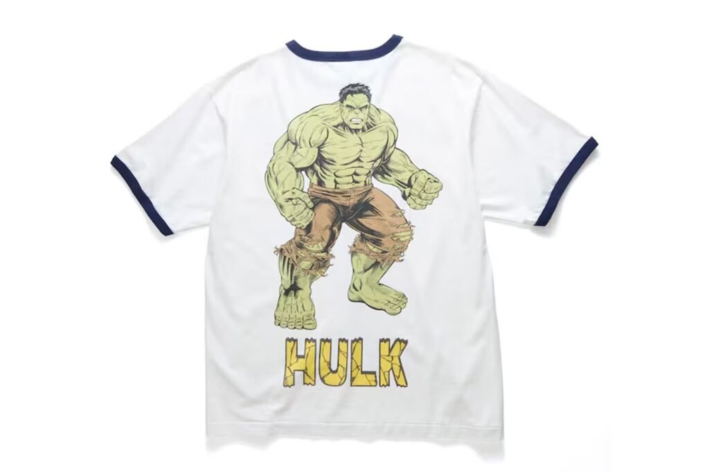 White T-shirt with navy trim featuring a large Hulk graphic and the word HULK on the back
