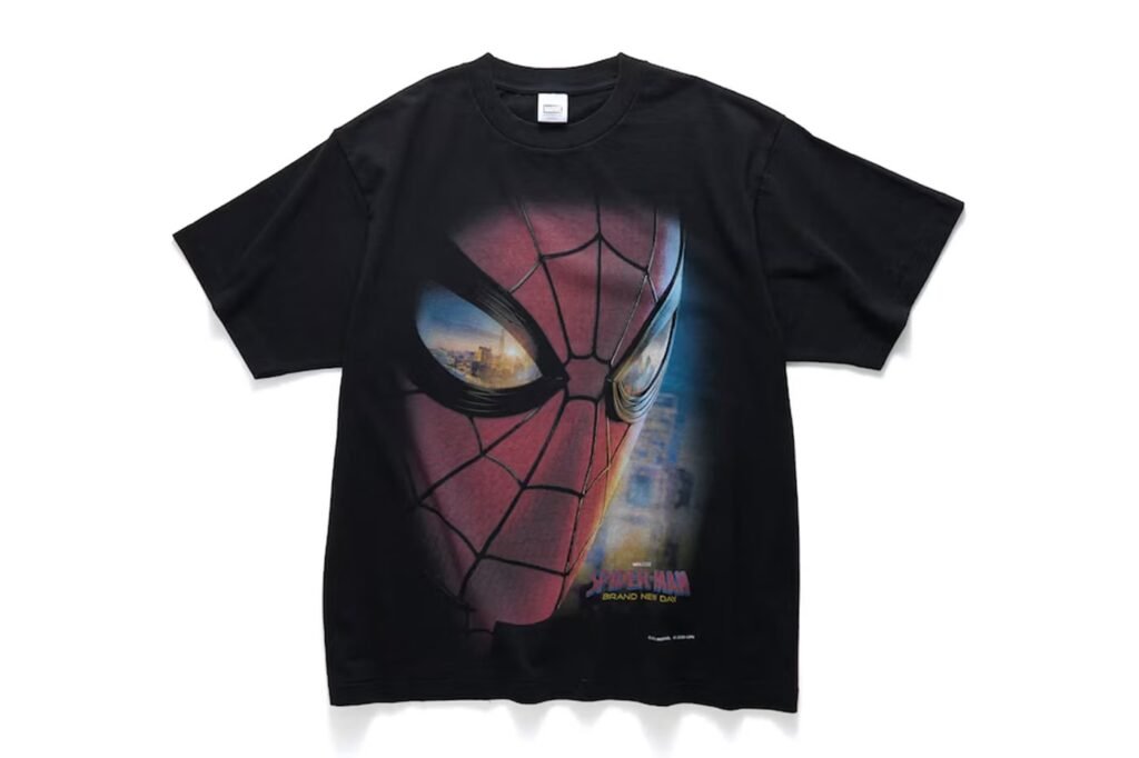 Black Spider-Man graphic T-shirt with a large close-up face print and “Spider-Man: Brand New Day” text
