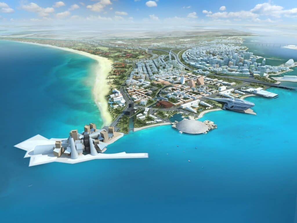 Aerial rendering of Saadiyat Island with beaches, turquoise water, and modern waterfront buildings