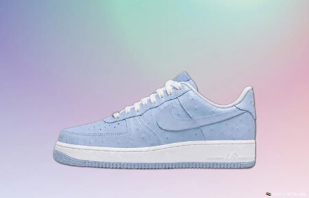 Light blue Nike Air Force 1 sneaker on a pastel gradient background