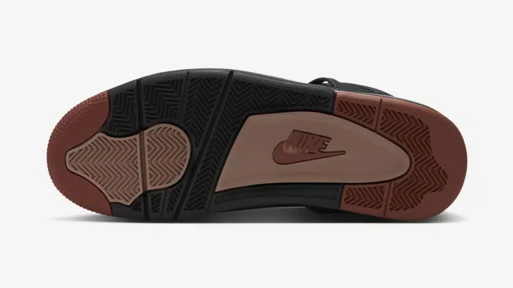 Nike air jordan 4 'london' shoe outsole with black and brown herringbone traction patterns and a central Nike logo