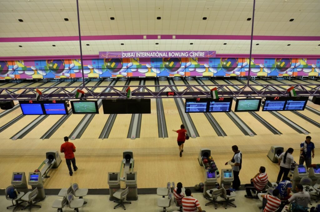 Bowling alley with players on multiple lanes at Dubai International Bowling Centre