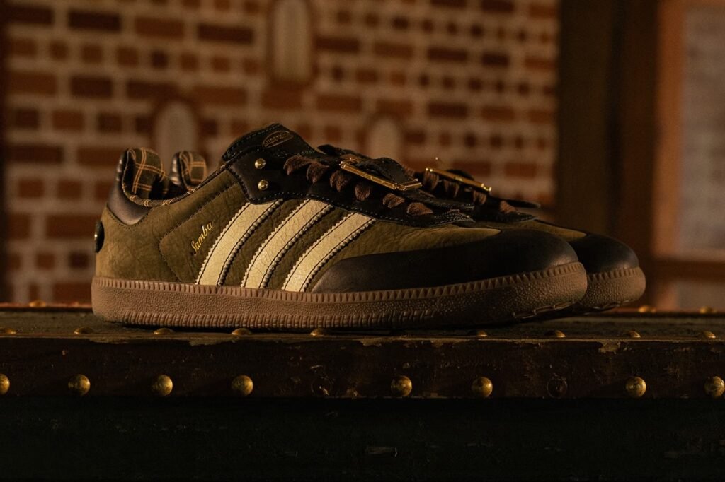 Pair of green and black adidas Samba ‘Heirloom’ sneakers on a metal surface