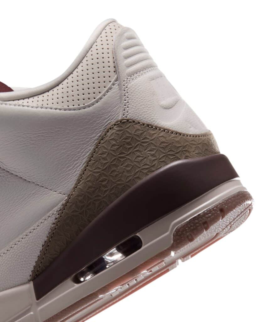 Close-up of an Air Jordan 3 Middle East sneaker featuring perforated panels, patterned suede accents, and a visible air-cushioned sole