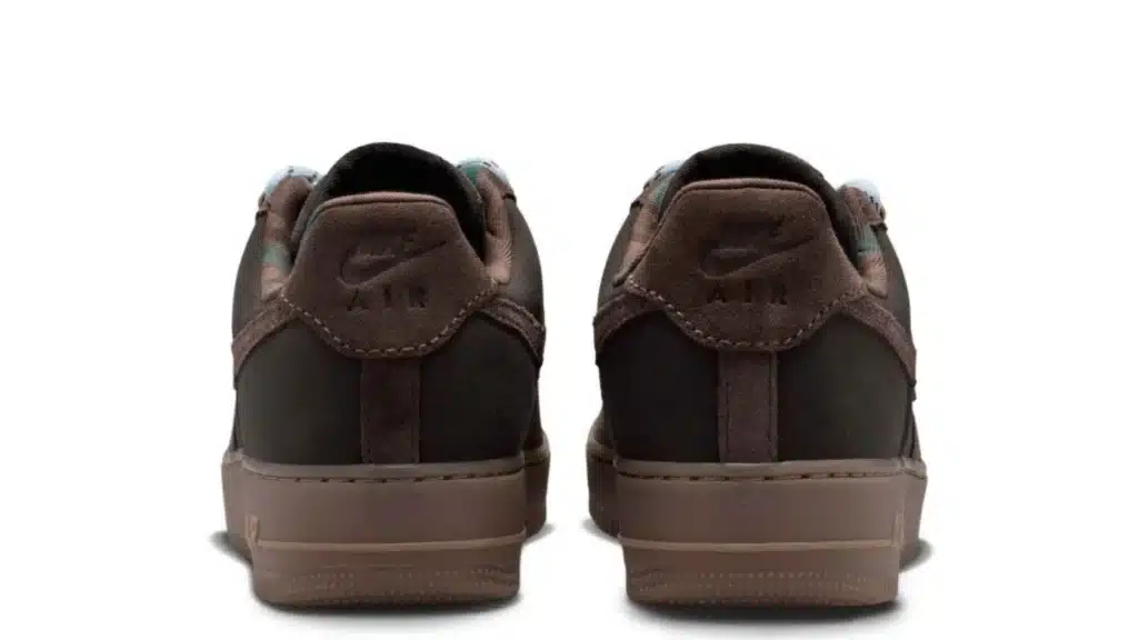 Pair of brown Nike sneakers shown from the rear